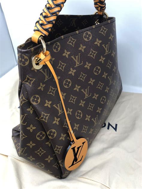 lv braided handle bag|louis vuitton braided handle handbag.